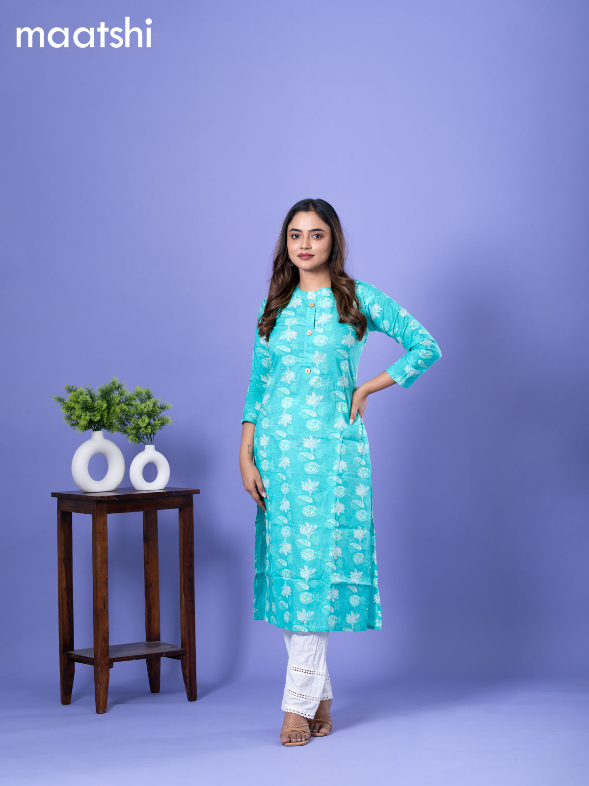 Cotton readymade kurti teal blue with allover prints & simple neck pattern and without pant