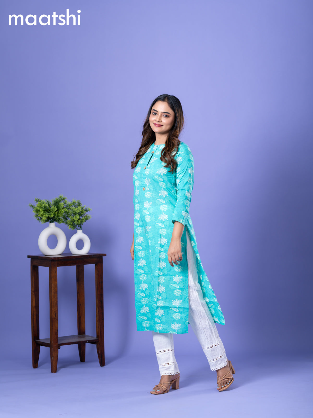 Cotton readymade kurti teal blue with allover prints & simple neck pattern and without pant