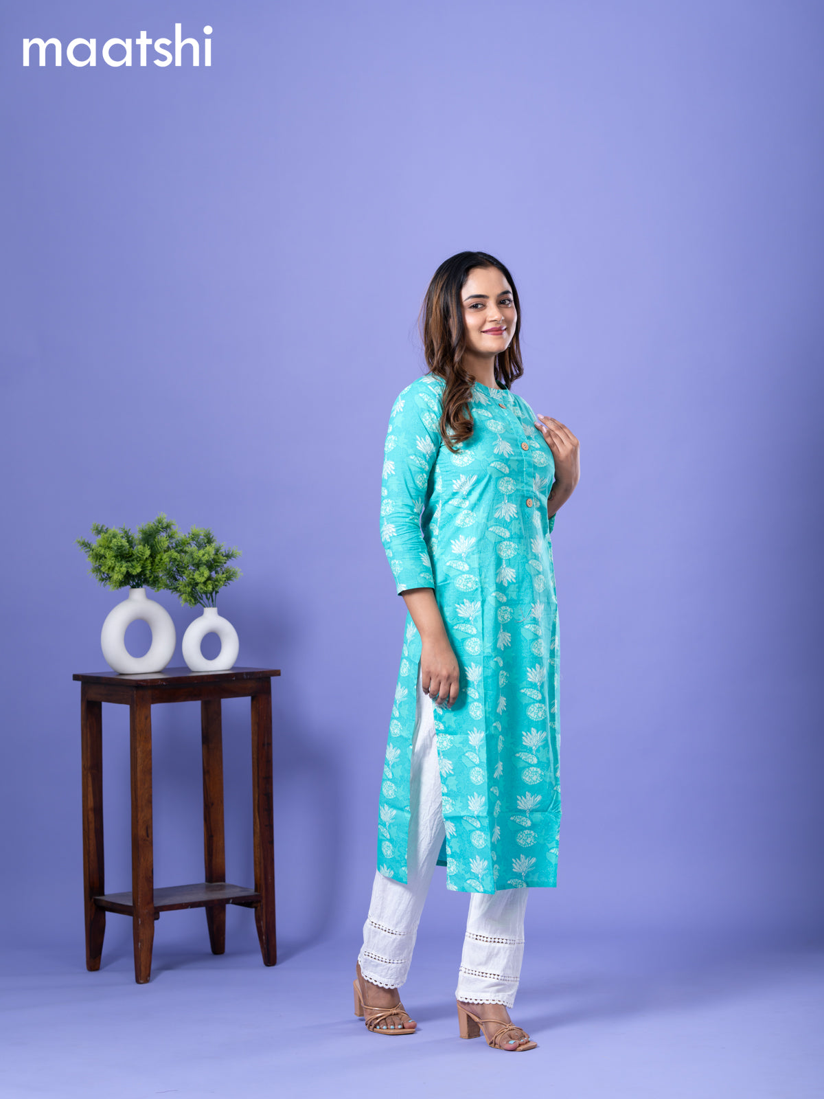 Cotton readymade kurti teal blue with allover prints & simple neck pattern and without pant