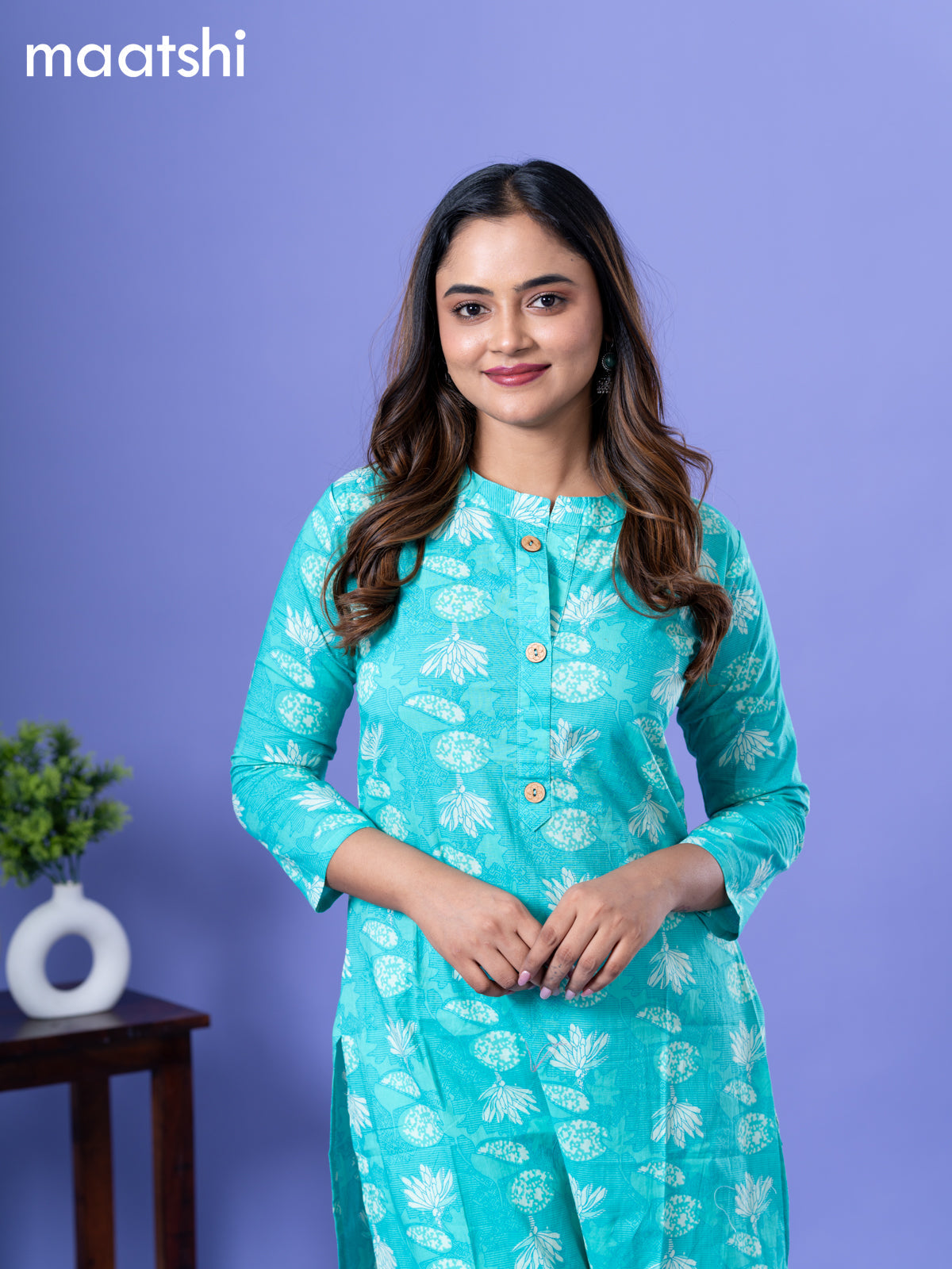 Cotton readymade kurti teal blue with allover prints & simple neck pattern and without pant