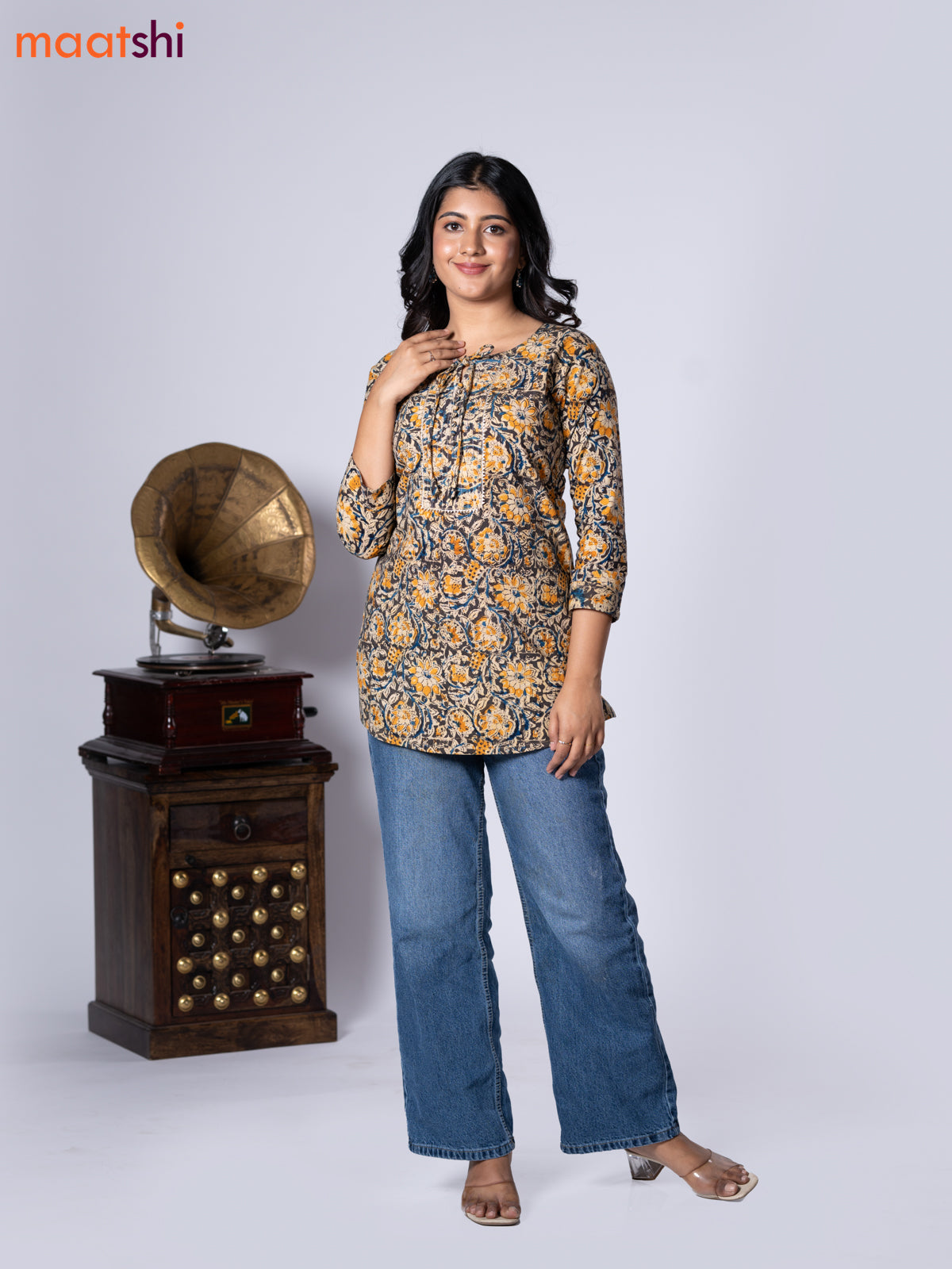 Kalamkari cotton short kurti multi colour and yellow shade with allover prints & lace work neck pattern without pant