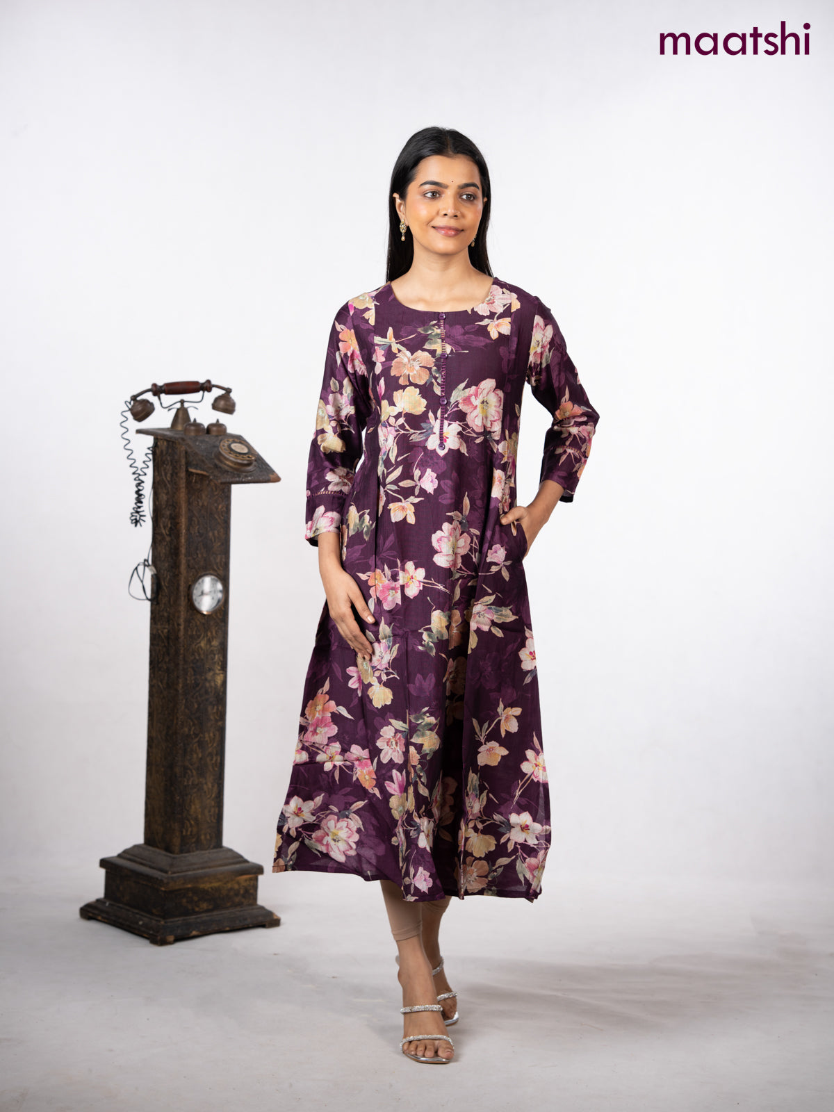 Rayon a-line kurti wine shade with allover floral prints & simple neck pattern without pant