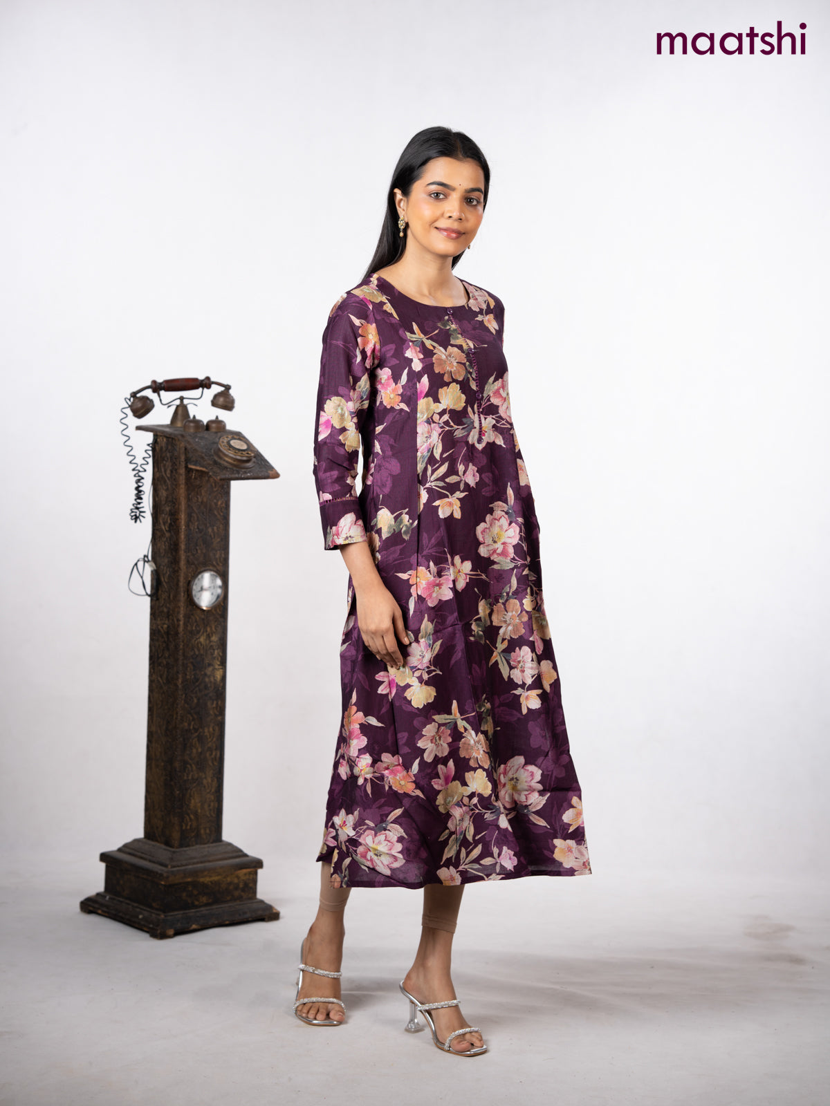 Rayon a-line kurti wine shade with allover floral prints & simple neck pattern without pant