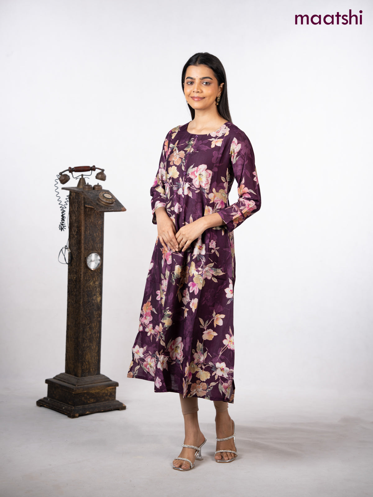 Rayon a-line kurti wine shade with allover floral prints & simple neck pattern without pant