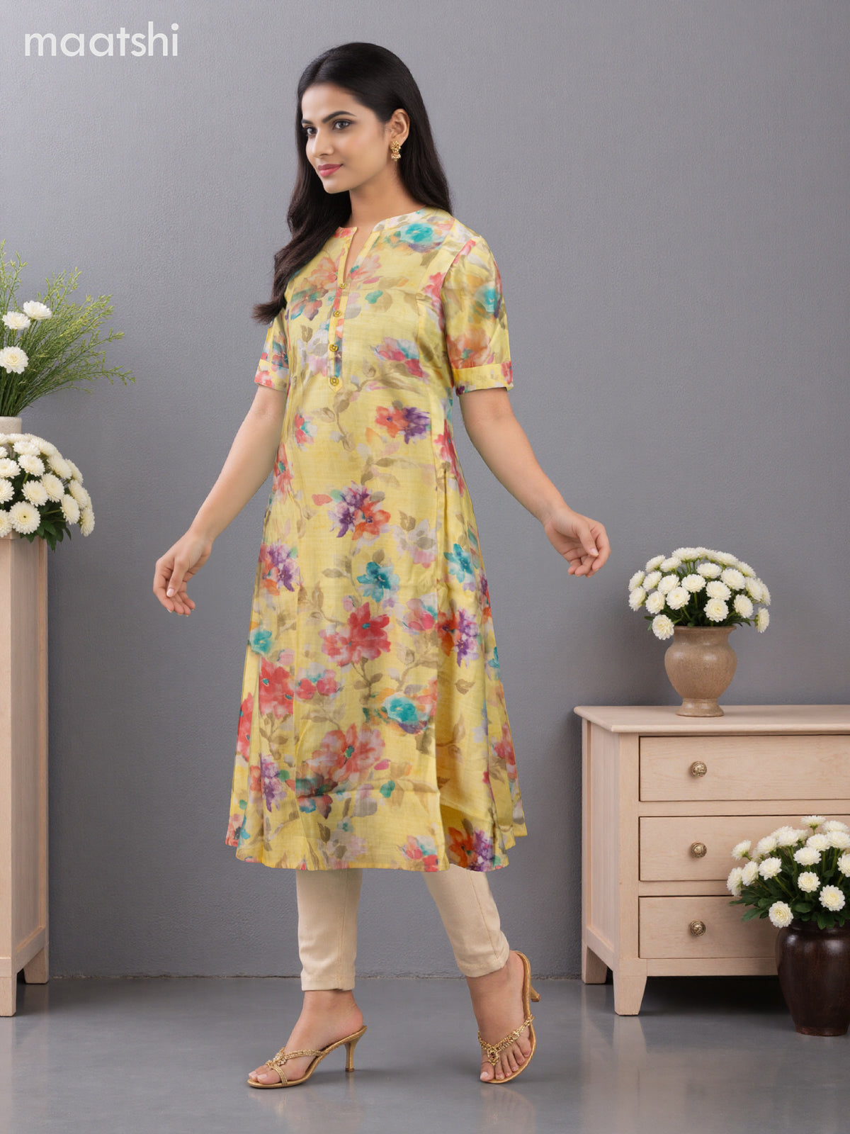 Rayon anarkali kurti pale yellow with allover floral prints & simple neck pattern without pant