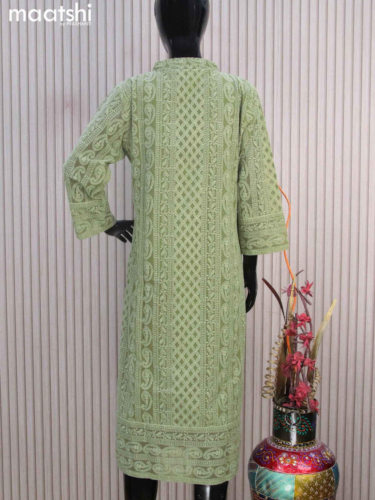 Semi georgette readymade kurti pastel green with allover chikankari work & simple neck pattern without pant
