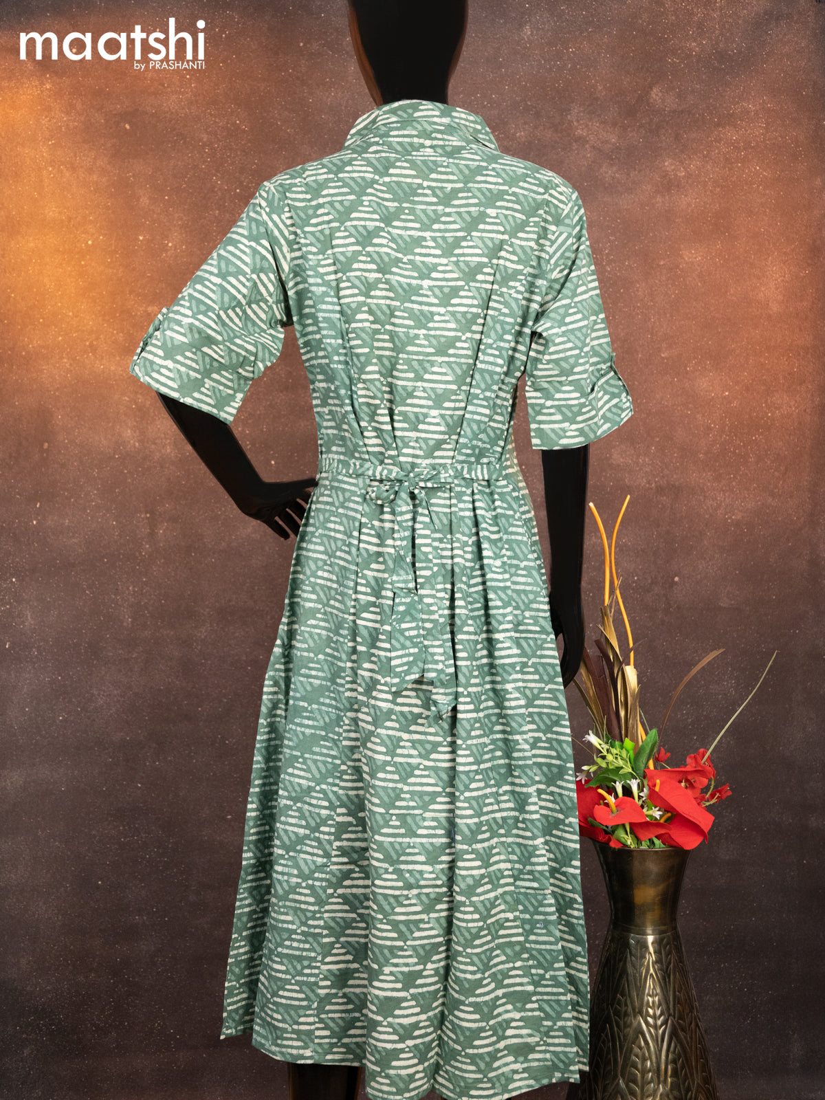 Cotton readymade A-line kurti pastel green with allover batik prints & simple neck pattern without pant