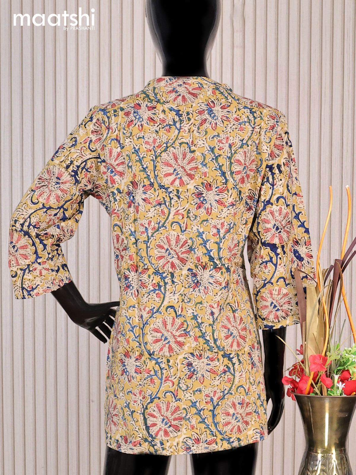 Cotton readymade short kurti yellow shade and multi colour with allover kalamkari prints sequin work & simple neck pattern without pant