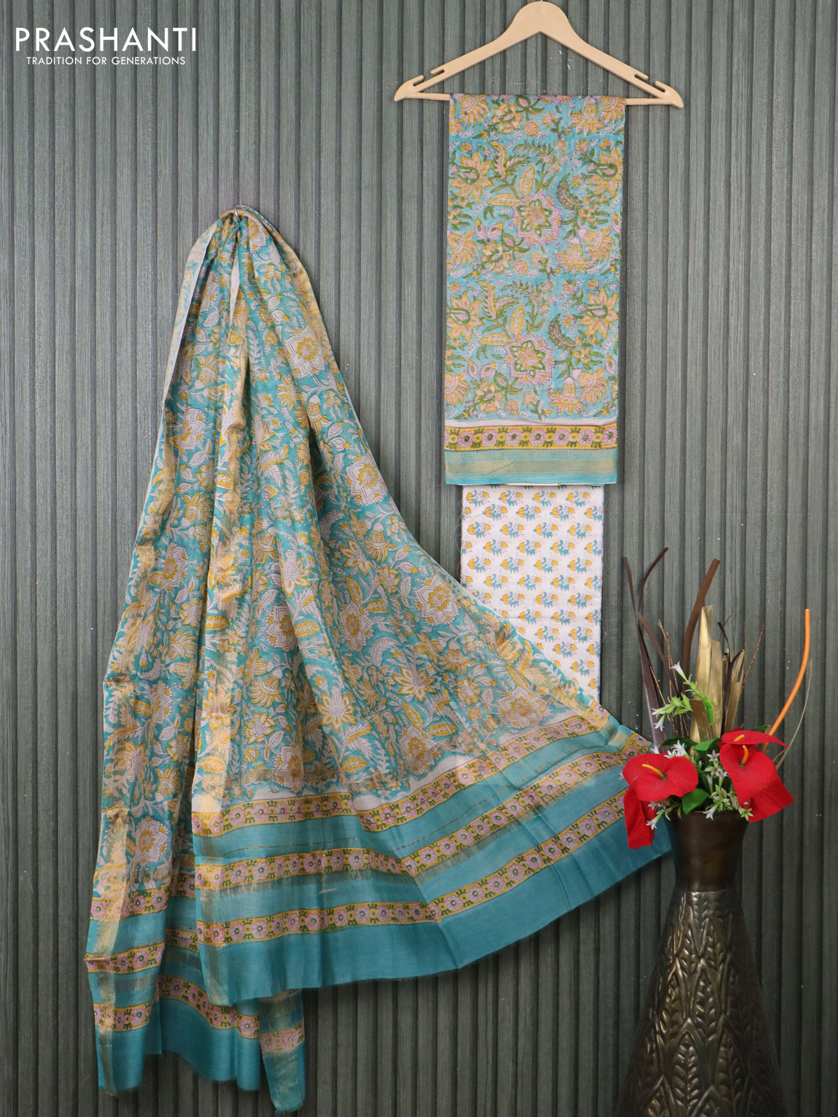 Chanderi dress material teal blue and cream with allover kalamkari prints and maheshwari zari border Chanderi dress material teal blue and cream with allover kalamkari prints and maheshwari zari border