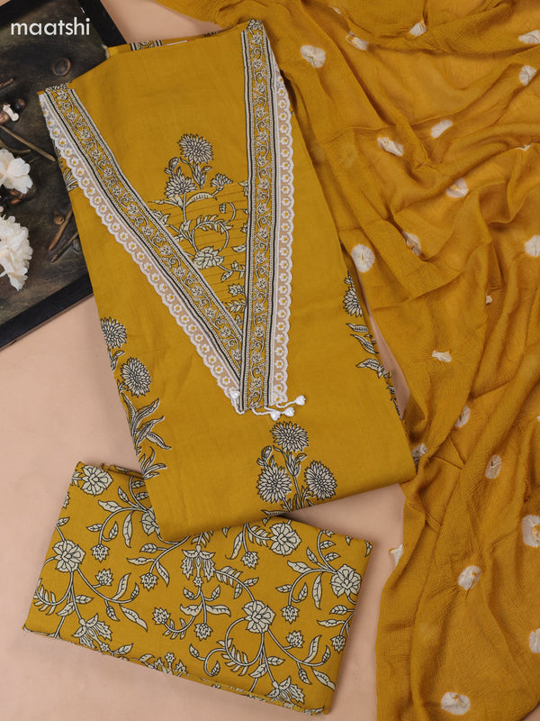 Mustard Yellow Cotton Dress Material With Floral Butta Prints