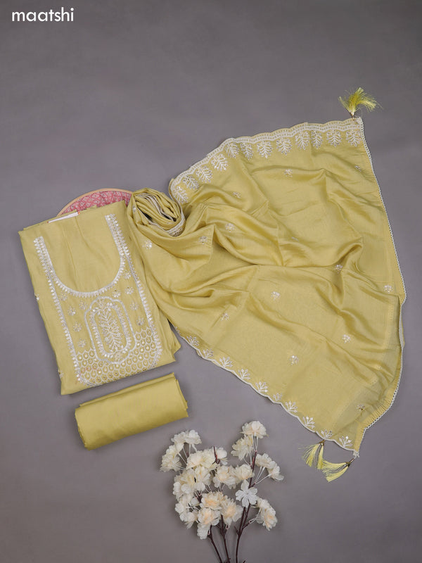 Pale Yellow Mul Chanderi Dress Materials With Floral Embroidery Work Neck Pattern