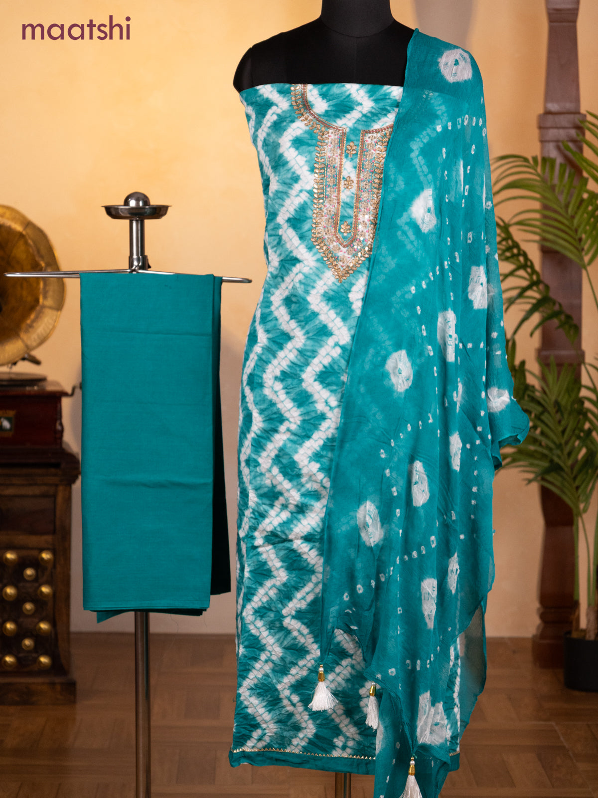 Bandhani dress materials teal green with shibori prints & zardosi work neck pattern and bottom & chiffon dupatta Bandhani dress materials teal green with shibori prints & zardosi work neck pattern and bottom & chiffon dupatta