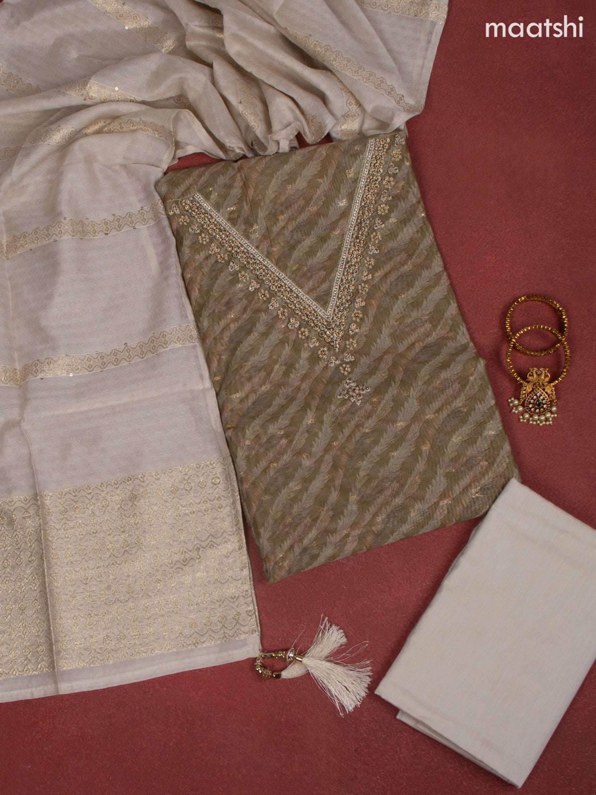 Raw Silk dress material mehandi green with allover prints & beaded work v neck pattern and bottom & banarasi dupatta