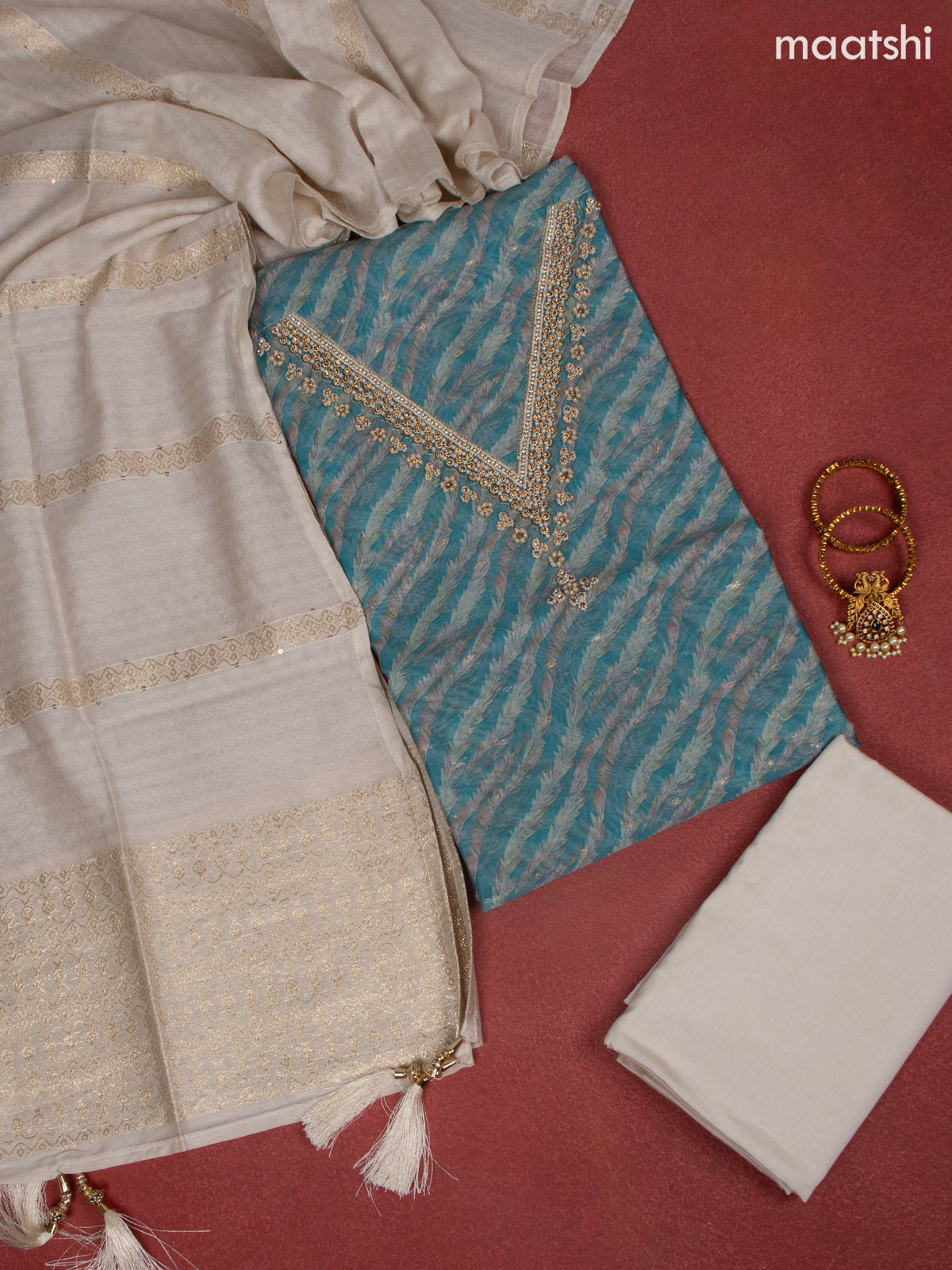 Raw Silk dress material teal blue with allover prints & beaded work v neck pattern and bottom & banarasi dupatta