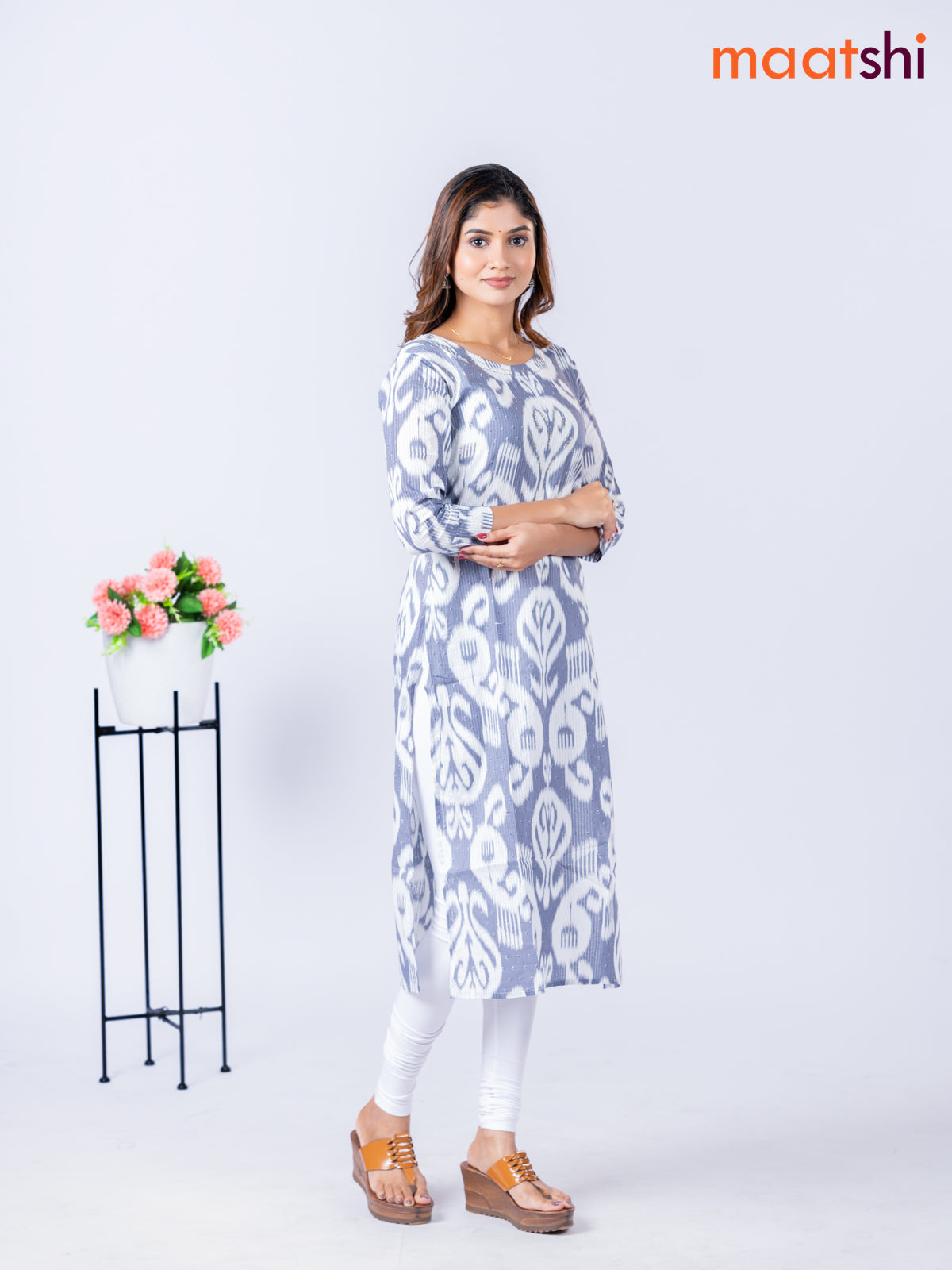 Cotton kurti with allover ikat weaves & beaded work neck pattern without pant