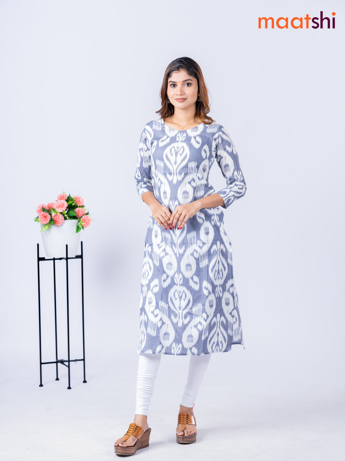 Cotton kurti with allover ikat weaves & beaded work neck pattern without pant