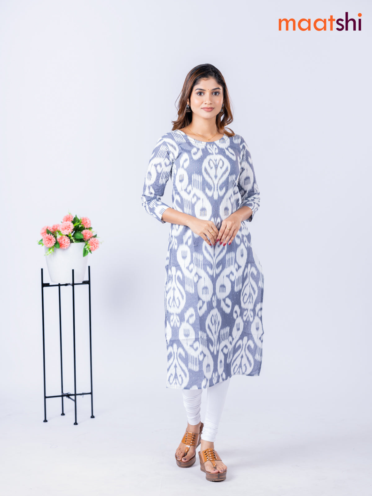 Cotton kurti with allover ikat weaves & beaded work neck pattern without pant