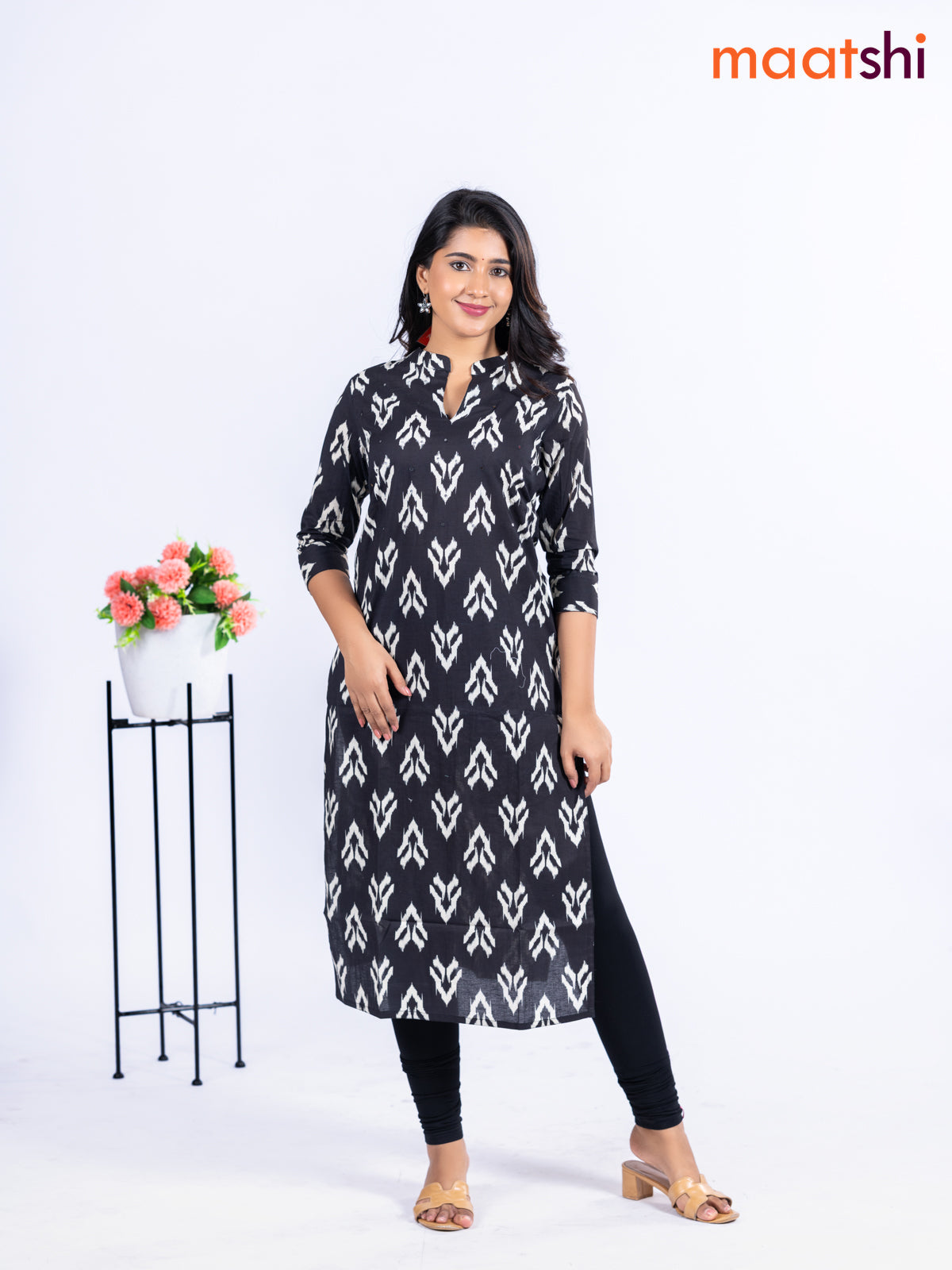 Cotton kurti black with allover ikat butta prints & simple neck pattern without pant