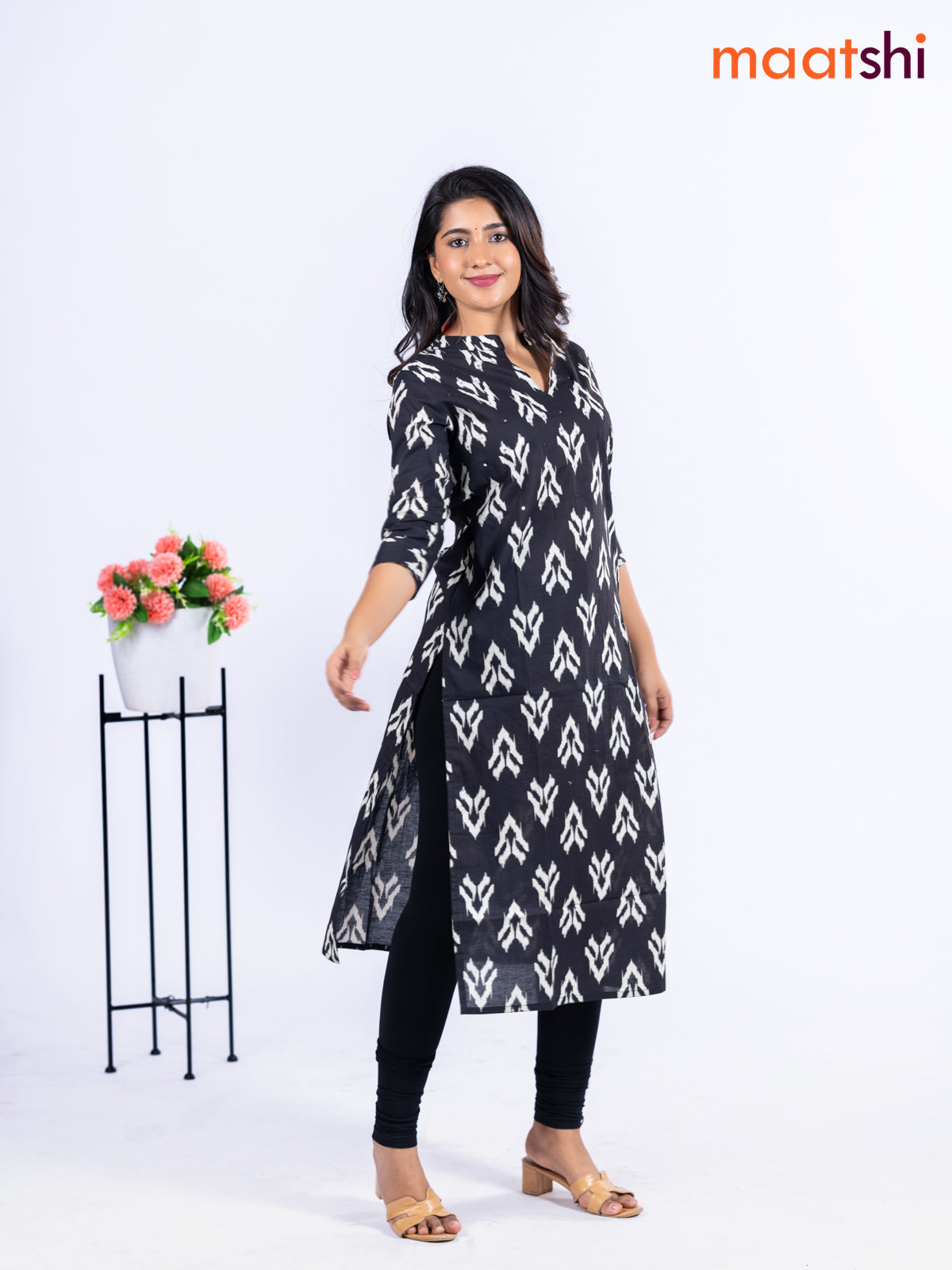 Cotton kurti black with allover ikat butta prints & simple neck pattern without pant