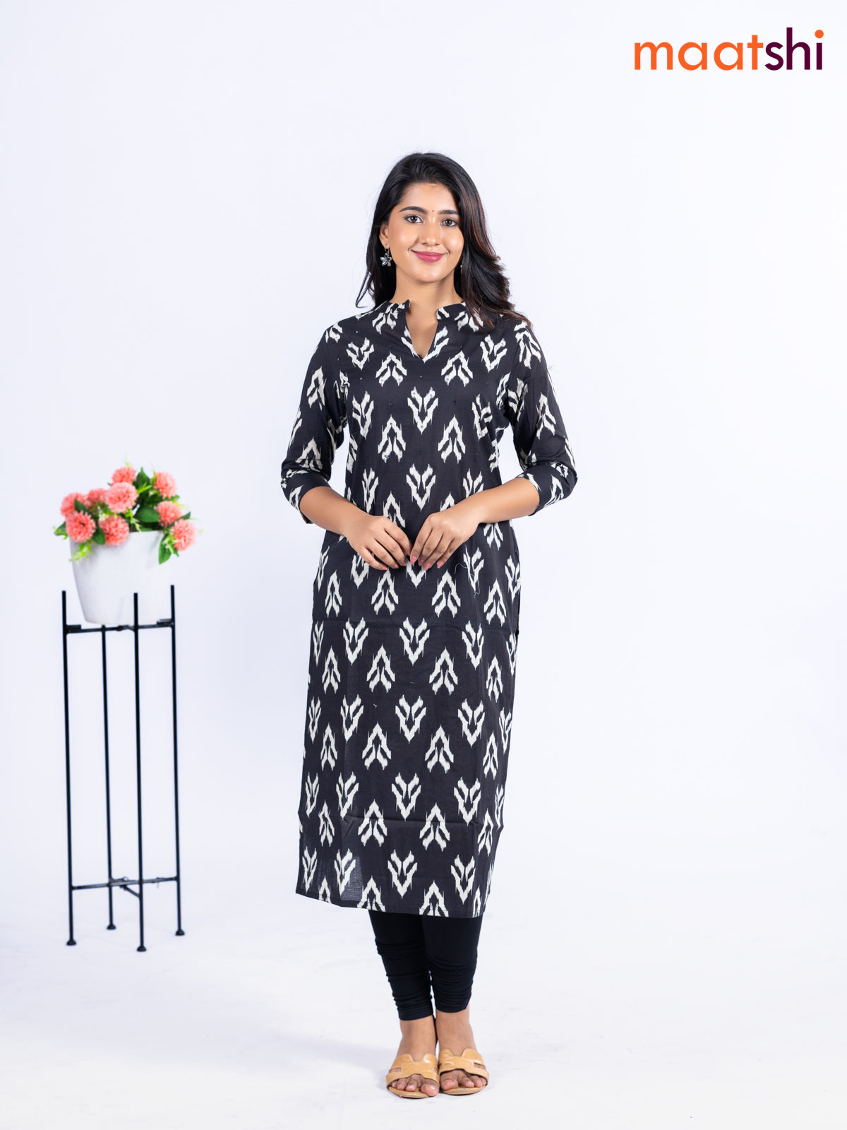 Cotton kurti black with allover ikat butta prints & simple neck pattern without pant