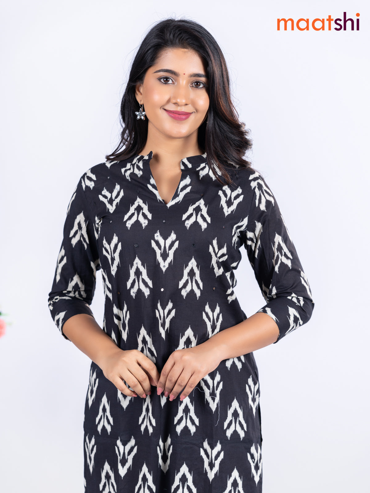Cotton kurti black with allover ikat butta prints & simple neck pattern without pant