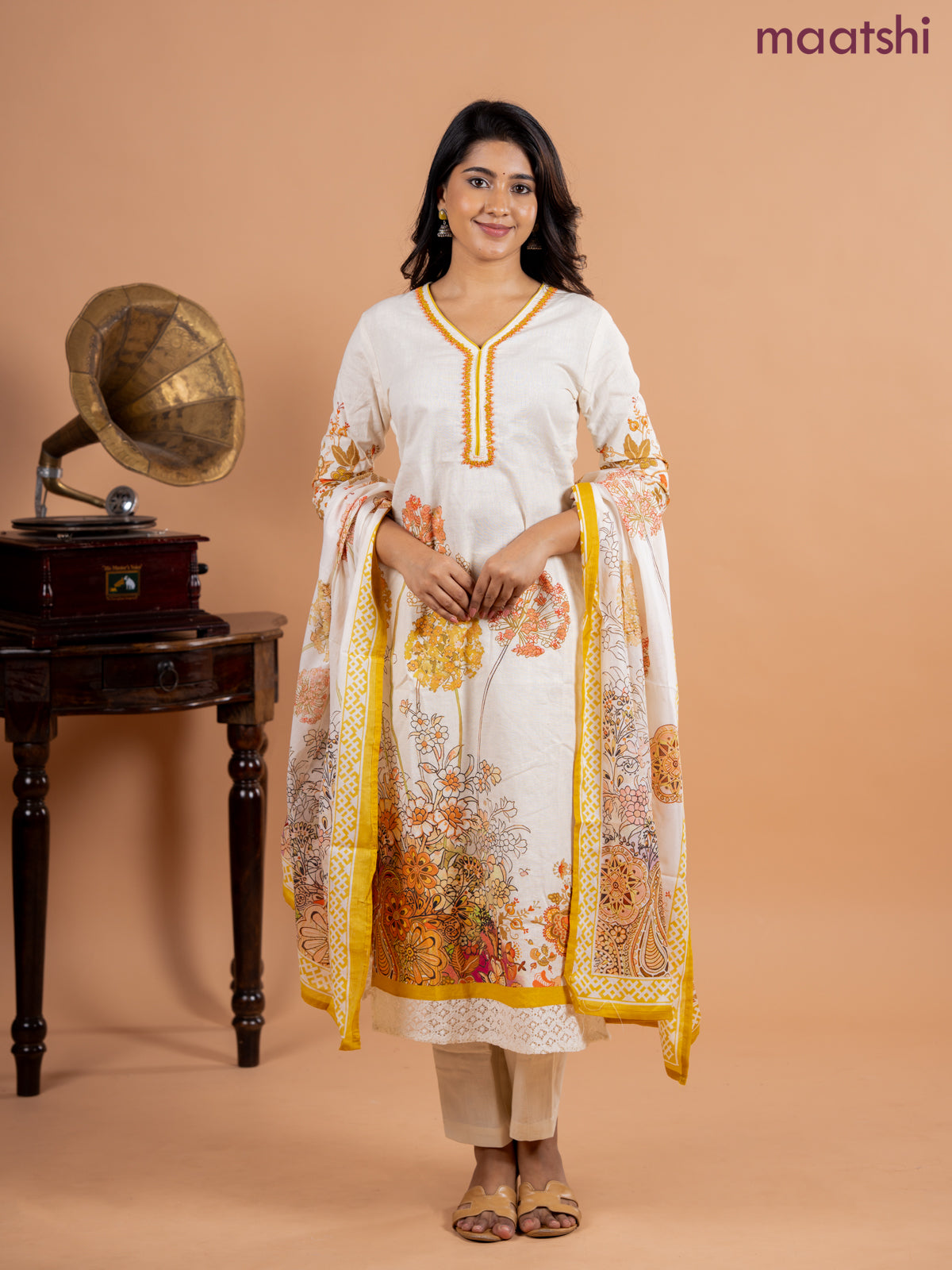 Placement salwar suit cream and mustard shade with prints & embroidery beaded work v neck pattern and straight cut pant & printed dupatta