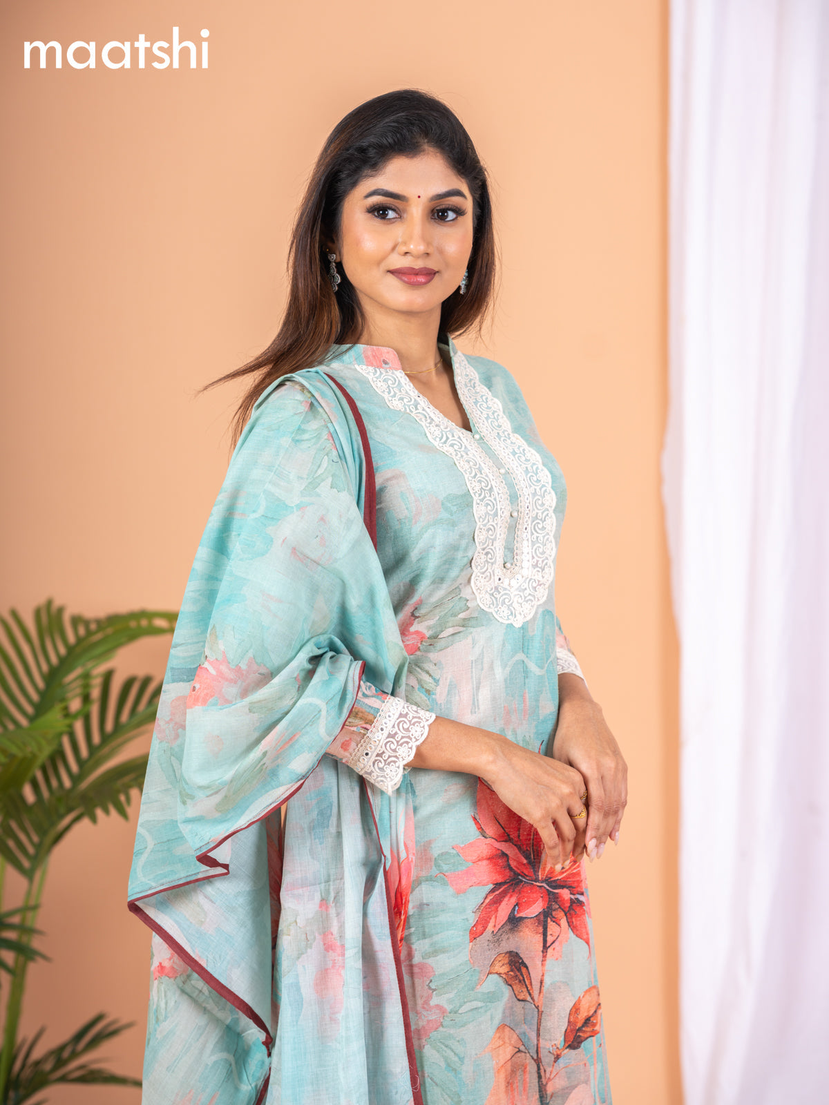 Placement print salwar suit teal green with prints & crocia lace work neck pattern and straight cut pant & dupatta