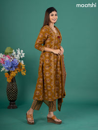 Cotton anarkali salwar suit mustard yellow with allover butta prints & zardosi sequin work v neck pattern and straight cut pant & dupatta