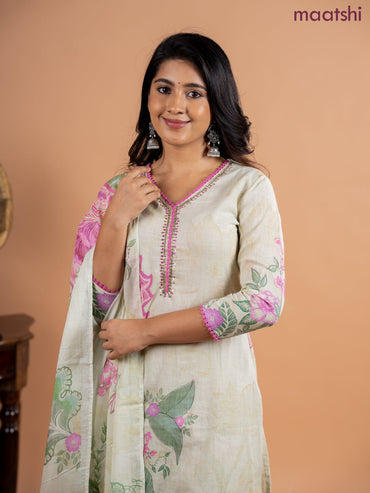 Placement salwar suit mild pista green and pink with allover prints & sequin lace work v neck pattern and straight cut pant & printed dupatta