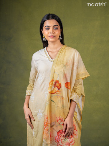Cotton salwar suit cream and pale yellow with embroidery work buttas & sequin lace work neck pattern and straight cut pant & dupatta