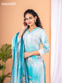 Placement print salwar suit off white and teal blue with prints & embroidery sequin work v neck pattern and straight cut pant & dupatta