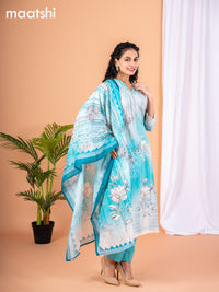 Placement print salwar suit off white and teal blue with prints & embroidery sequin work v neck pattern and straight cut pant & dupatta