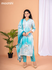 Placement print salwar suit off white and teal blue with prints & embroidery sequin work v neck pattern and straight cut pant & dupatta