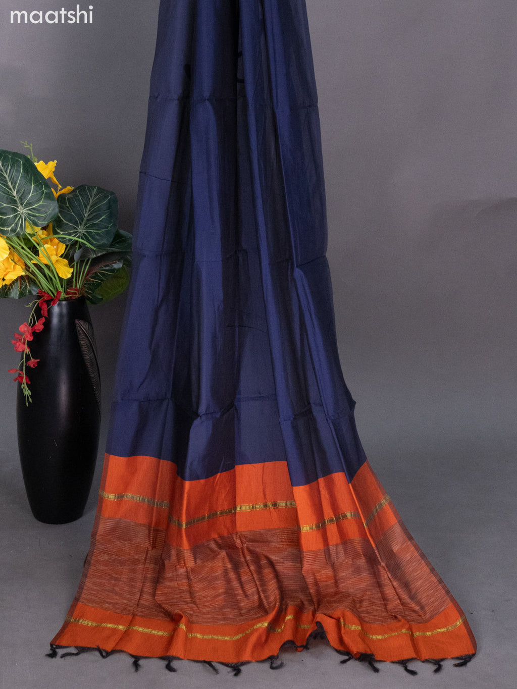 Rust Shade and Navy Blue Ikat Dress Material With Ikat Weaves