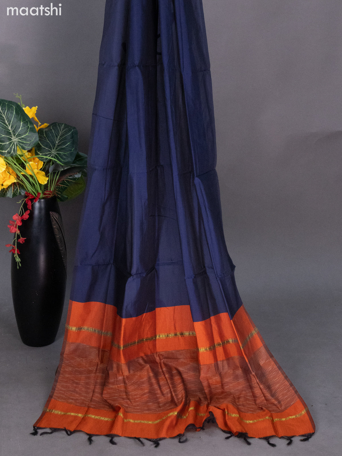 Rust Shade and Navy Blue Ikat Dress Material With Ikat Weaves