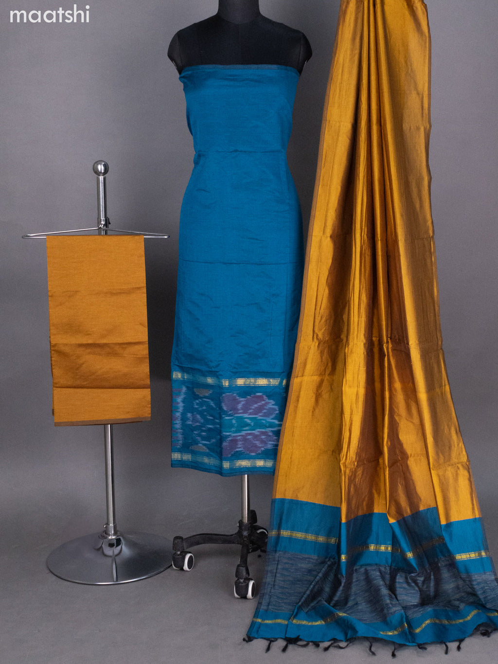 Peacock Blue and Mustard Shade Ikat Dress Material With Ikat Weaves