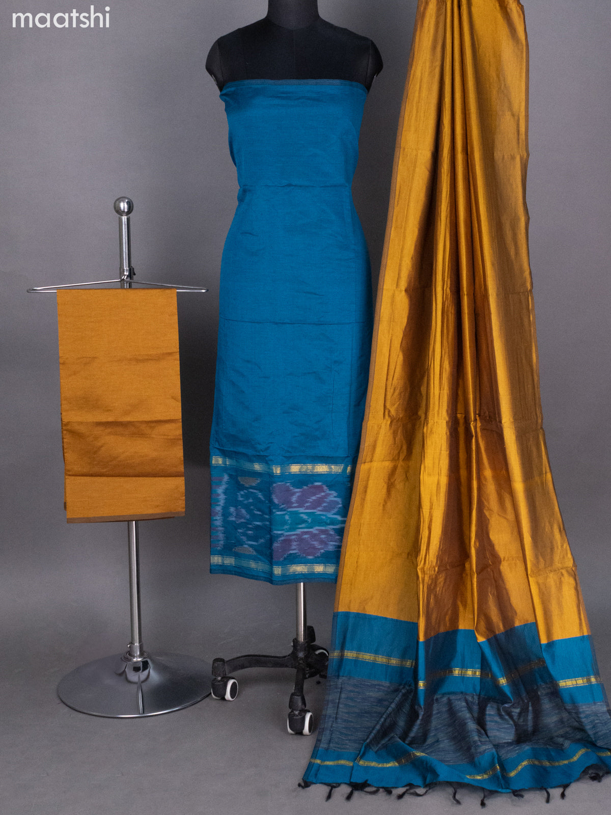 Peacock Blue and Mustard Shade Ikat Dress Material With Ikat Weaves