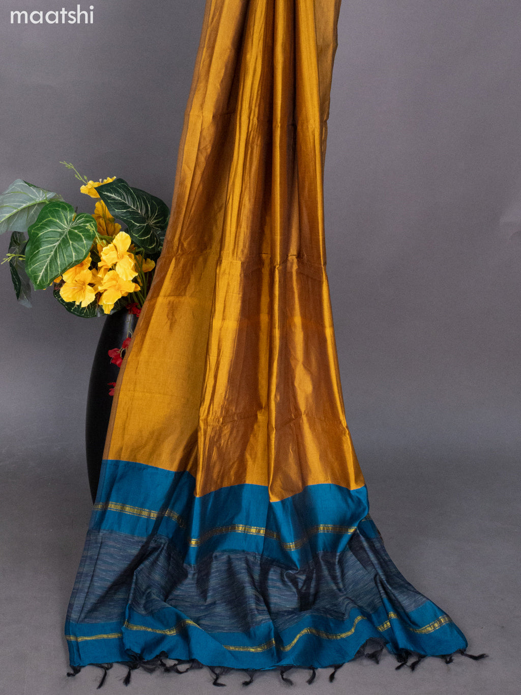 Peacock Blue and Mustard Shade Ikat Dress Material With Ikat Weaves