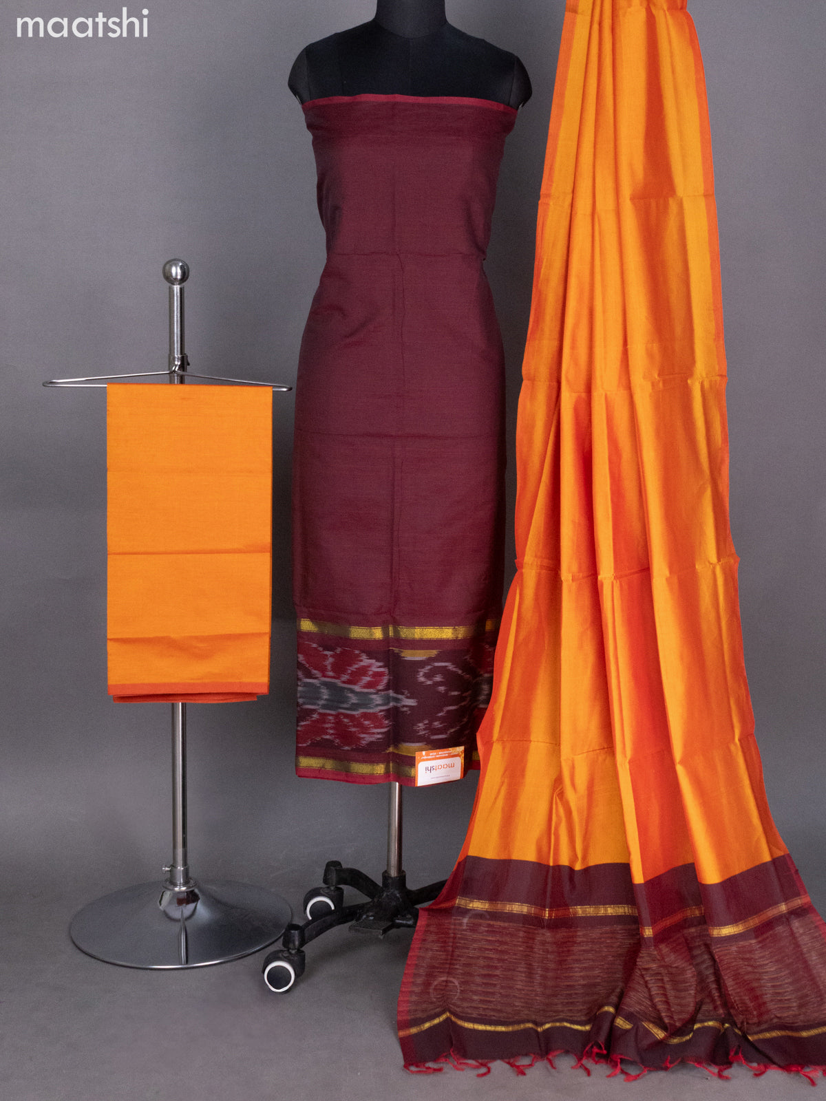 Dark Maroon and Sunset Orange Ikat Dress Material With Ikat Weaves