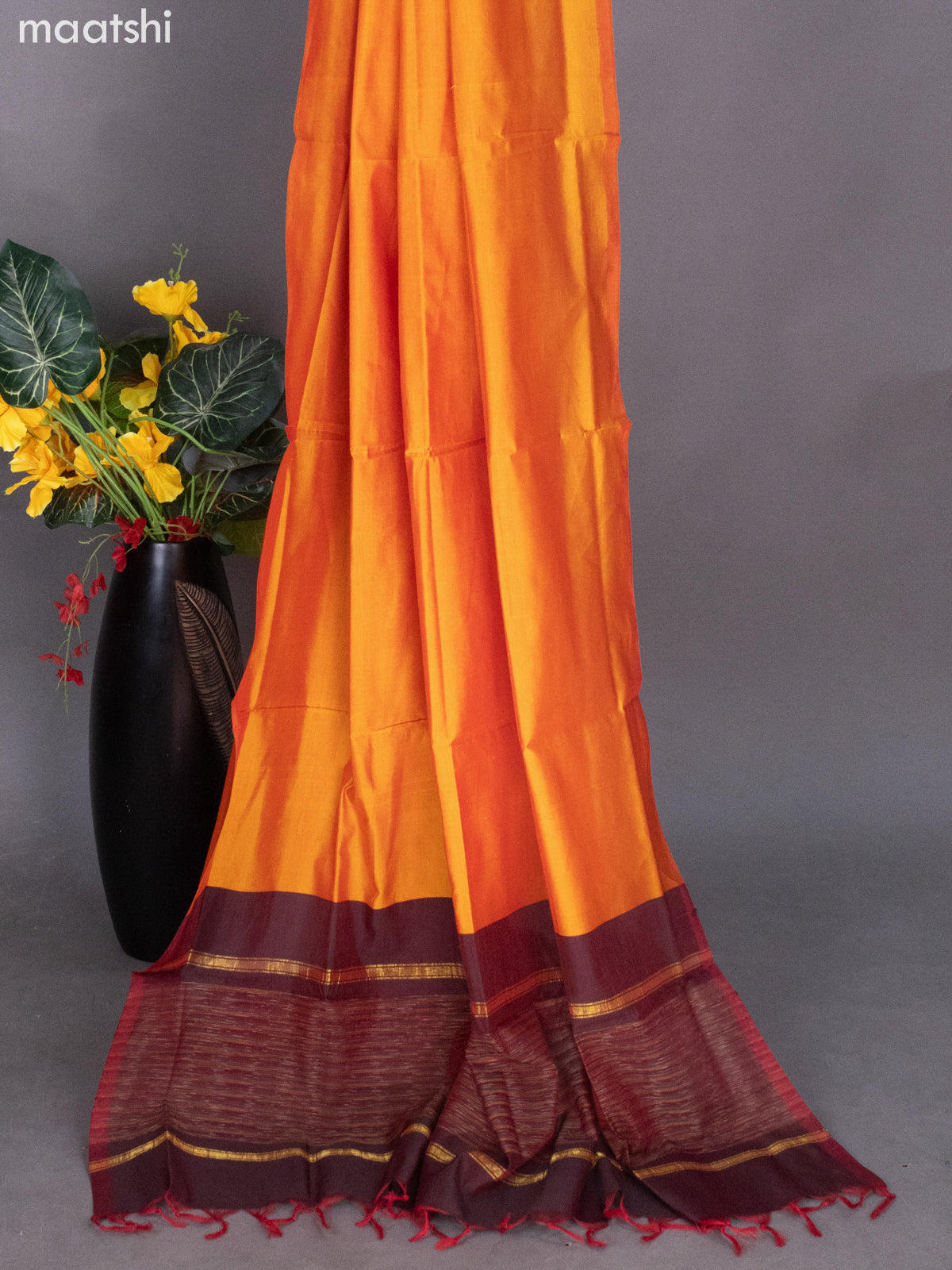 Dark Maroon and Sunset Orange Ikat Dress Material With Ikat Weaves