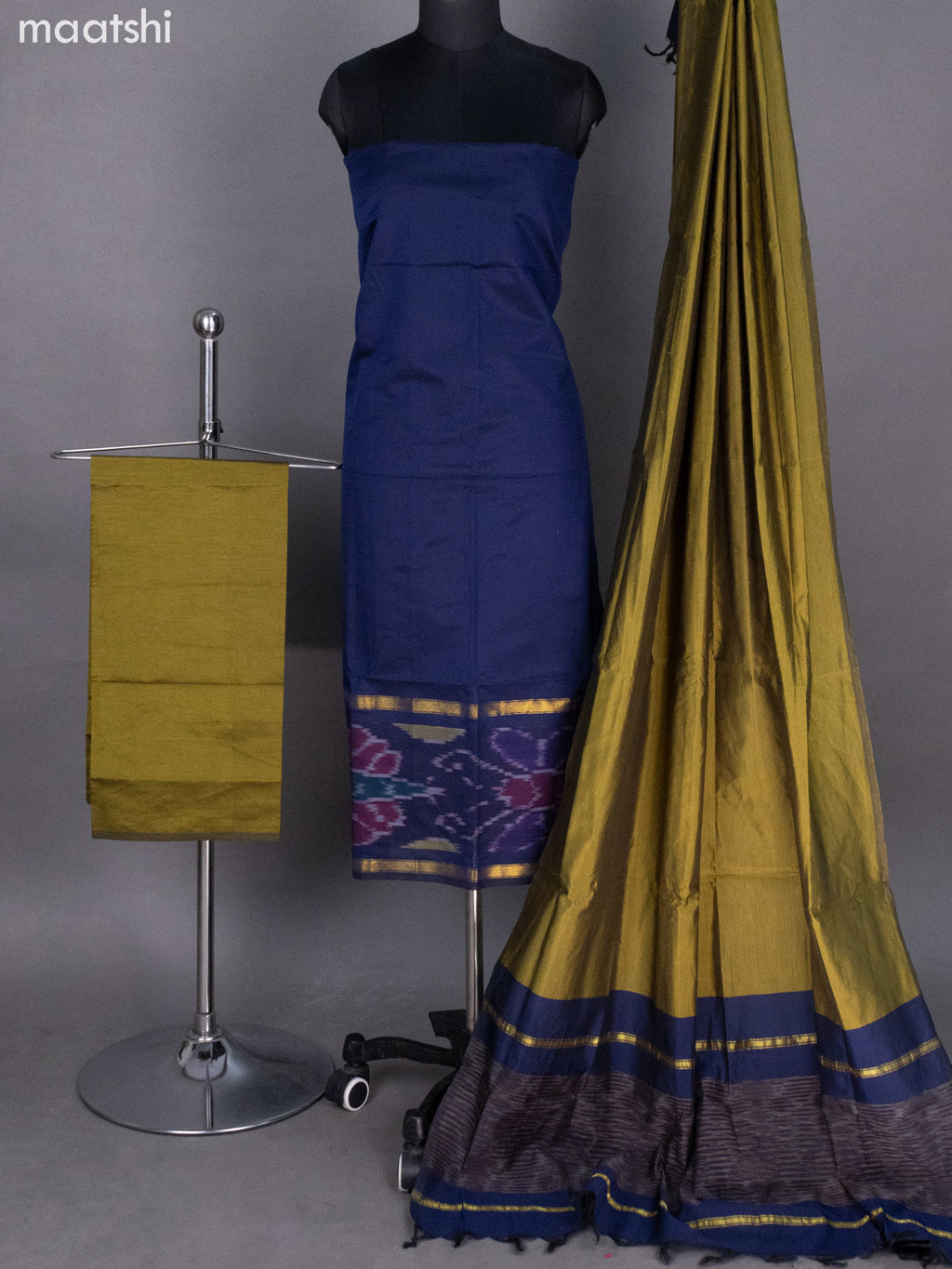 Navy Blue and Mehendi Green Ikat Dress Material With Ikat Weaves