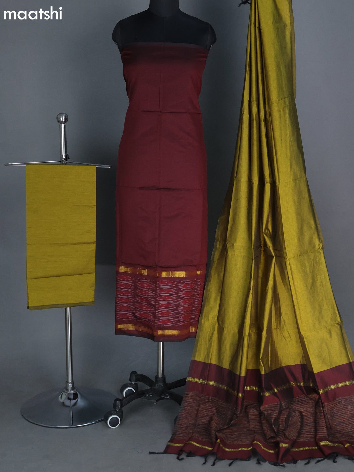 Deep Maroon and Mehendi Green Ikat Dress Material With Ikat Weaves
