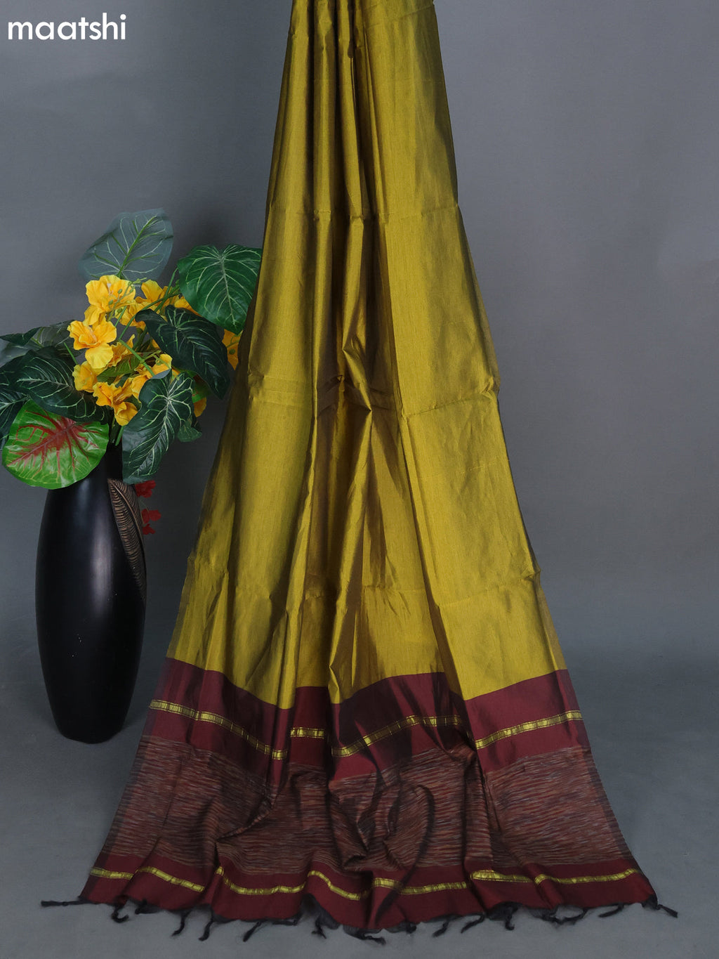 Deep Maroon and Mehendi Green Ikat Dress Material With Ikat Weaves