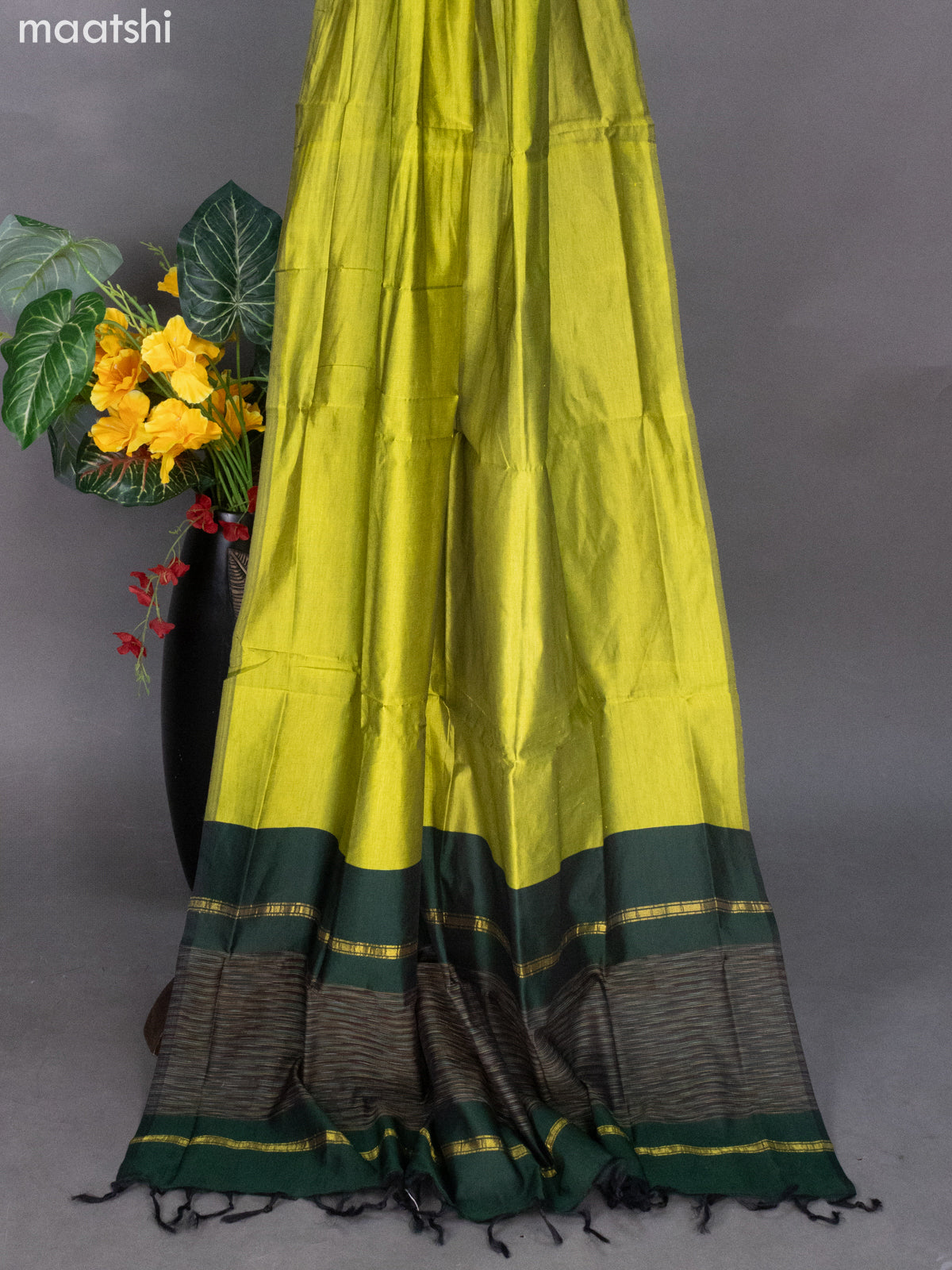 Dark Green and Lime Green Ikat Dress Material With Ikat Weaves