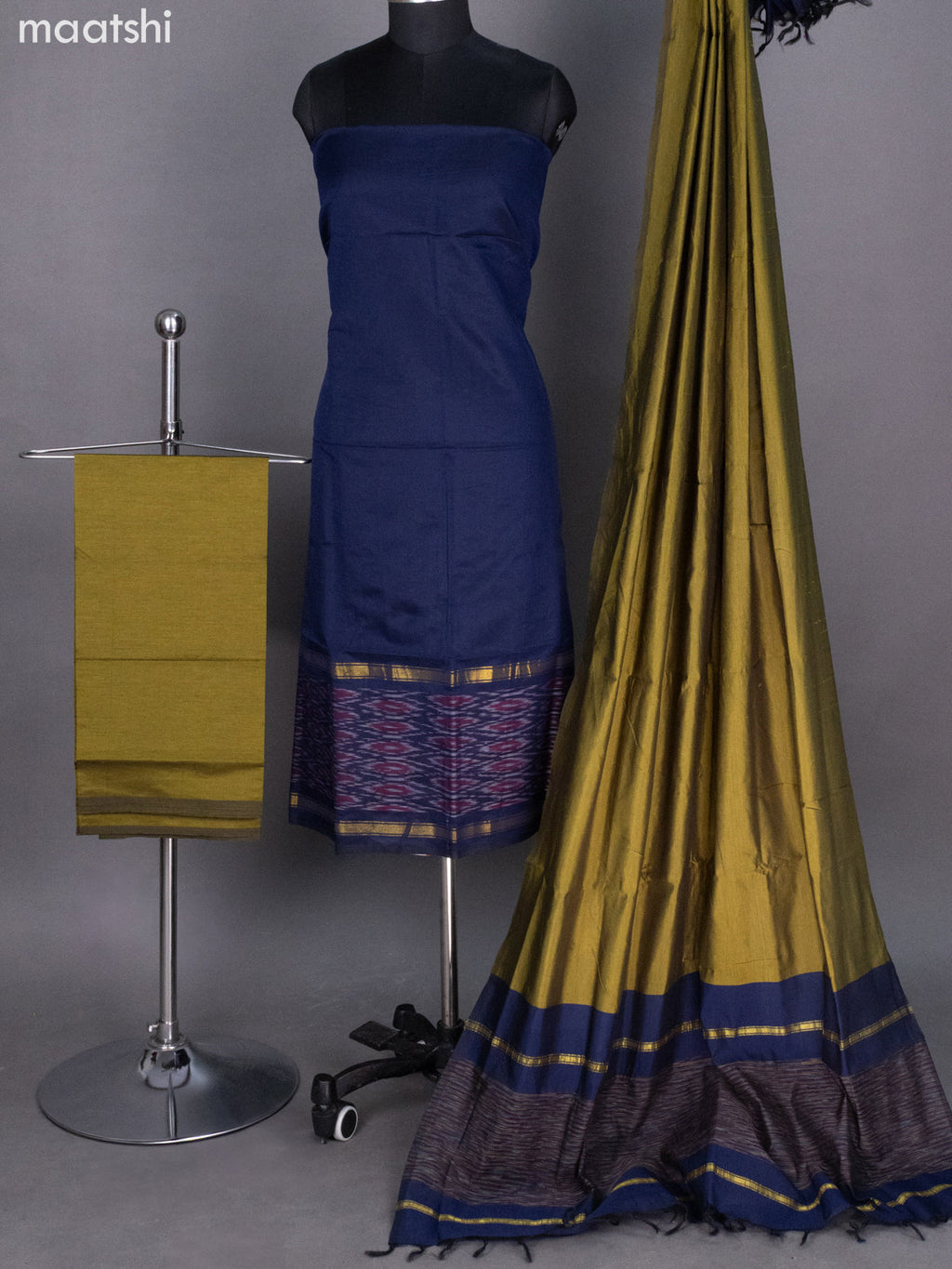 Navy Blue and Mehendi Green Ikat Dress Material With Ikat Weaves