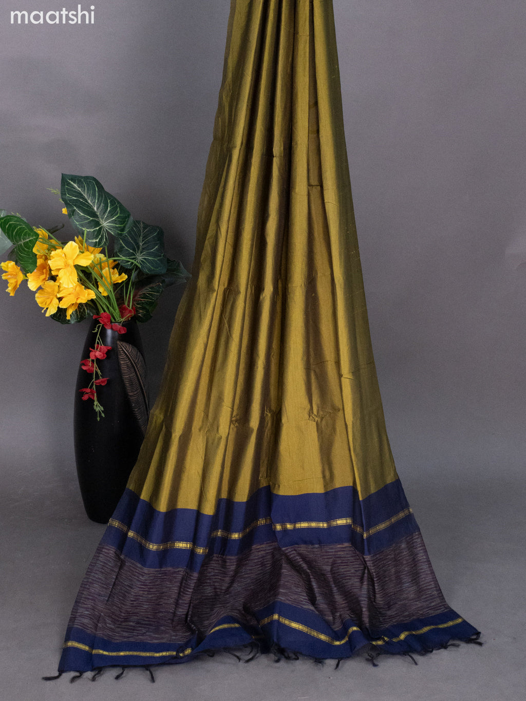 Navy Blue and Mehendi Green Ikat Dress Material With Ikat Weaves