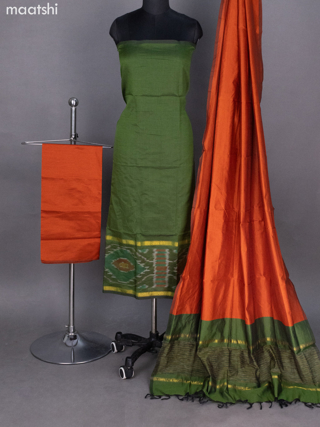 Sap Green and Rust Shade Ikat Dress Material With Ikat Weaves