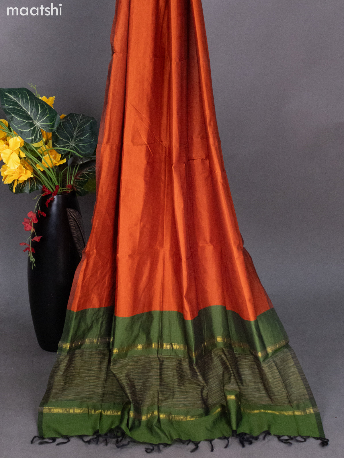 Sap Green and Rust Shade Ikat Dress Material With Ikat Weaves