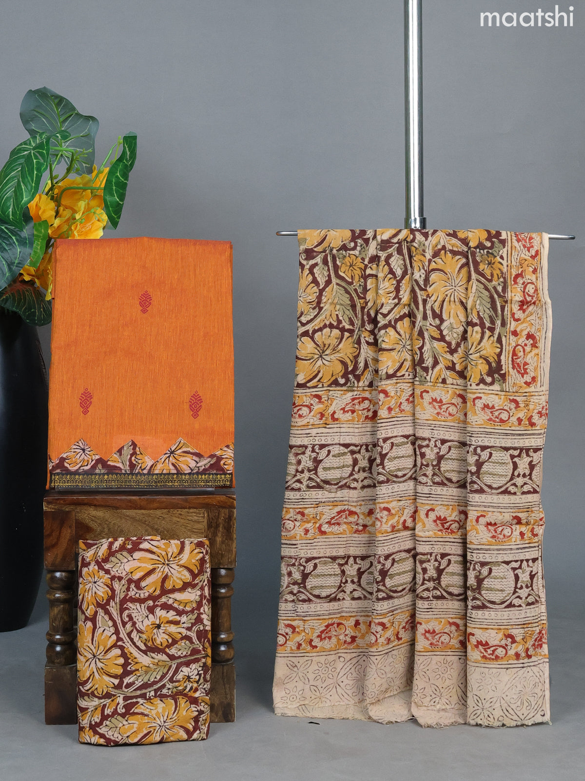 Rustic Orange and Dark Brown Cotton Dress Material With Printed Buttas