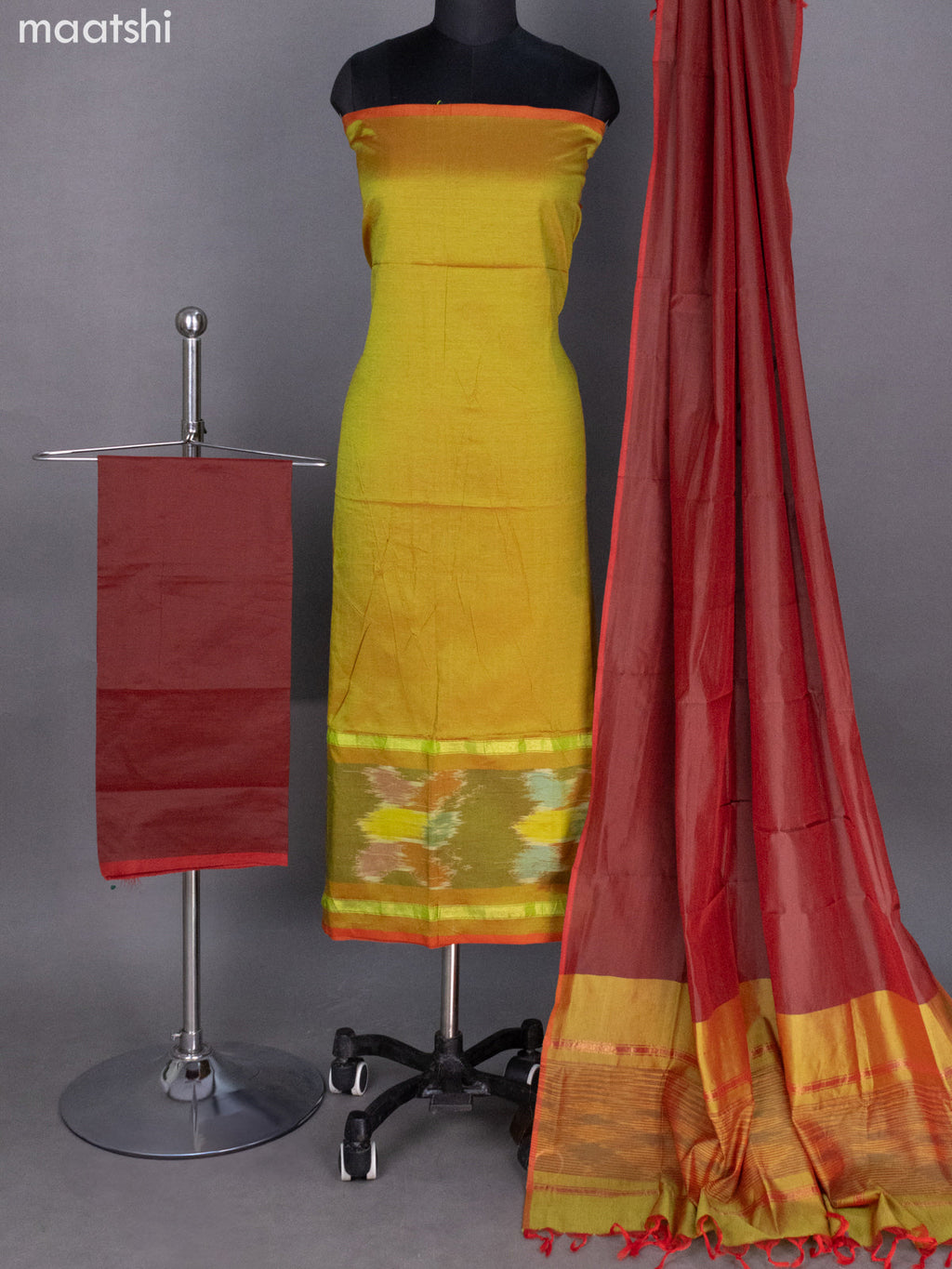 Dual Shade Of Green and Maroon Ikat Dress Material With Ikat Weaves